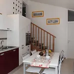 In 37070 Daire Bibione